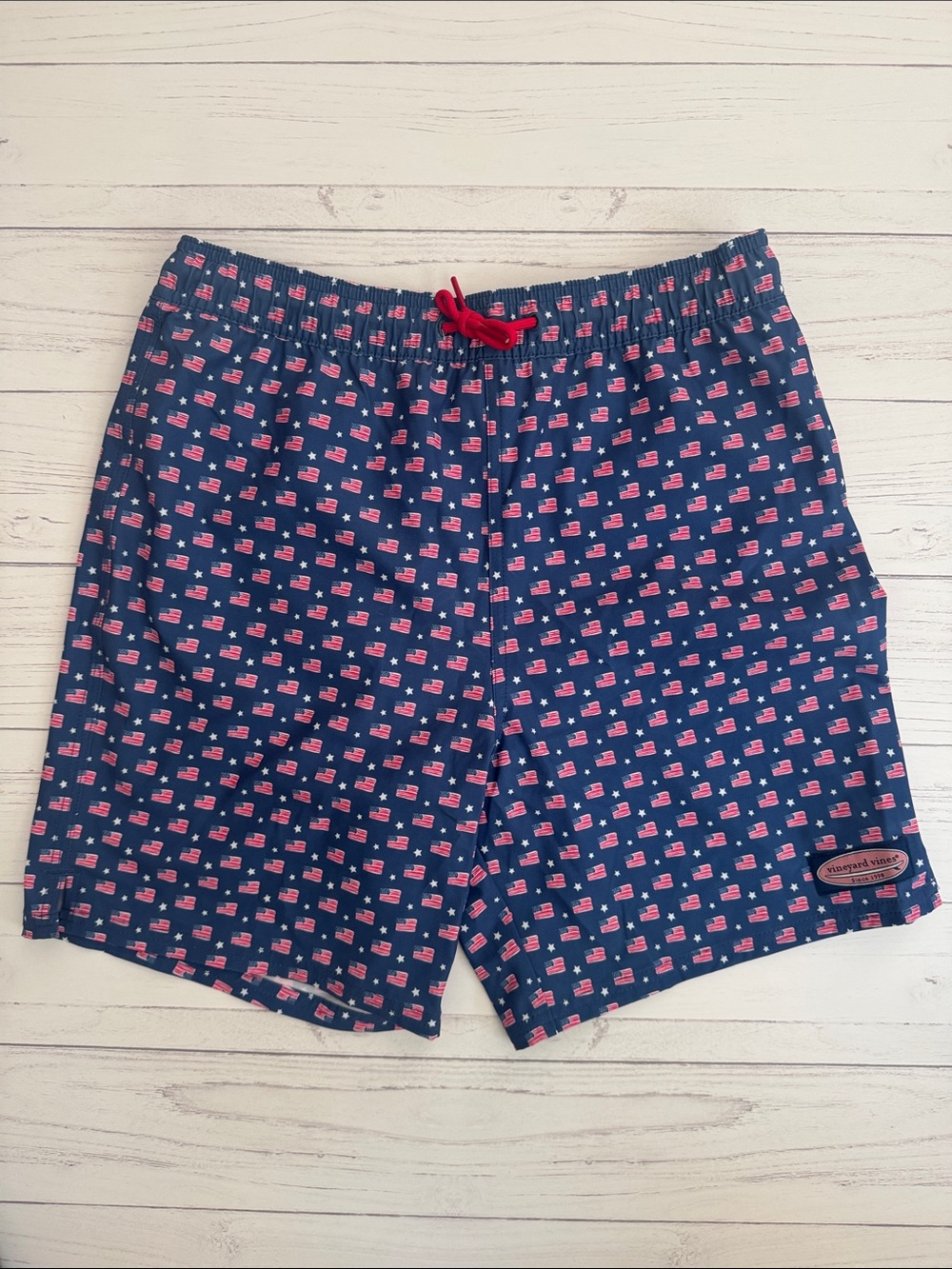 NWT Boys Vineyard Vines Navy Swim Trunks with Red and White Flag Print